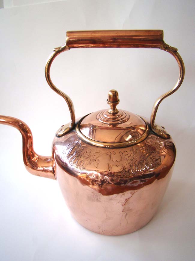 A large 19th century English copper kettle inscribed "GOD BLESS OUR HOME"